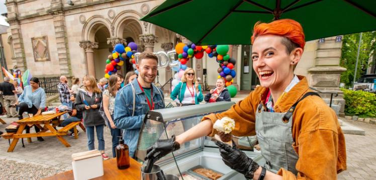 Food truck serving free street food at the Queen's Pride Picnic outside Elmwood Hall