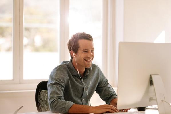 male office worker working at a desk