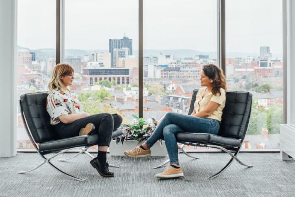 Two people in a meeting