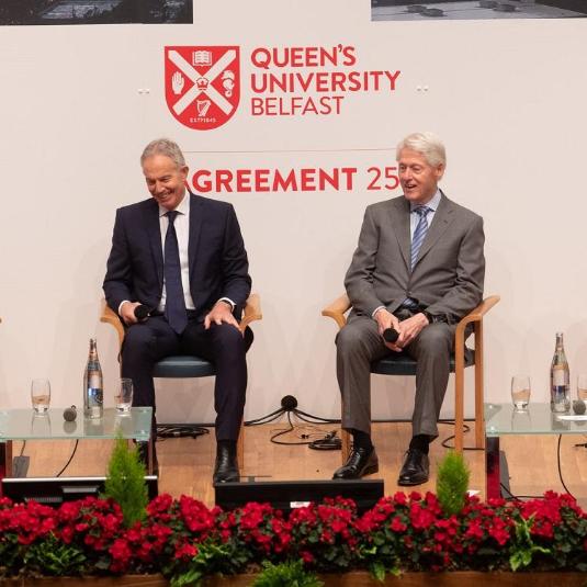Tony Blair and Bill Clinton in a panel discussion at Queen's University Belfast's Agreement 25 event in the Whitla Hall