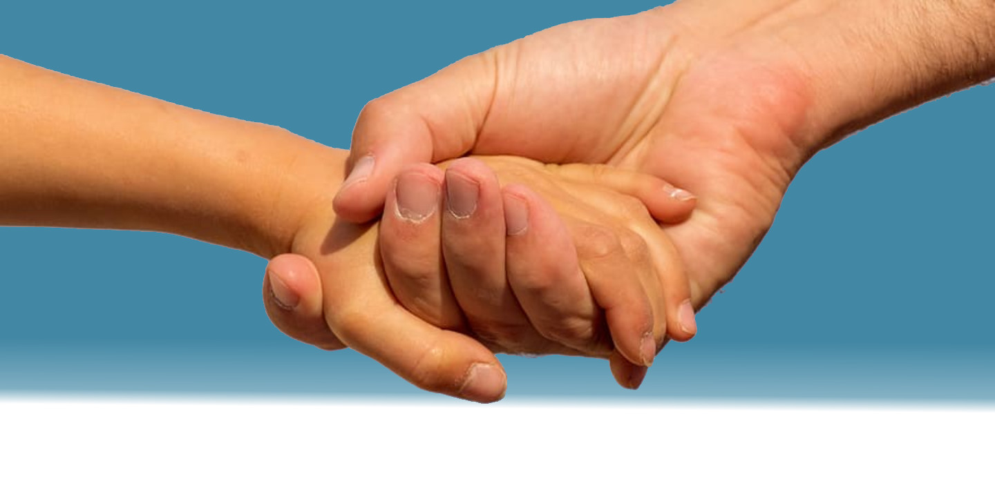 Father and child's hands, blue background